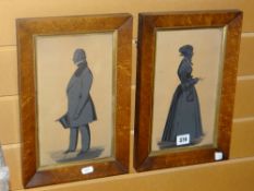 A pair of nineteenth century silhouettes of a gentleman and a lady, inscribed verso 'Elizabeth