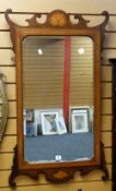 A good antique painted and inlaid mahogany framed wall mirror with scroll upper and lower section,