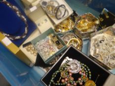 A box of assorted costume jewellery in boxes, cases and loose including quantity of modern silver