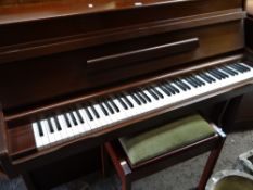 A modern Challen overstrung piano with stool