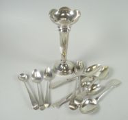 A silver tapered bud vase on a circular base (loaded) together with a collection of mixed silver