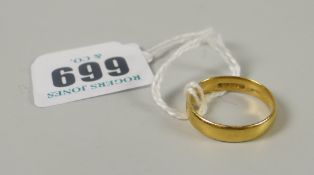 A 22ct yellow gold wedding band, 5grams Please note: not tested, hallmarks, weights and measurements