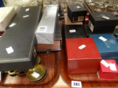 A cased bone-handled three-piece carving set, boxed cutlery, brassware, boxed crystal light spheres