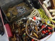 A tin of costume jewellery and beads ETC and a vintage Lyon's tea tin of coinage ETC