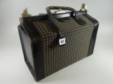 A vintage rigid Parfums Rochas Paris twin-handled overnight bag with matching purse inside