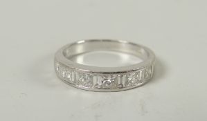 An 18ct white gold half-hoop diamond eternity ring, 3.4gms Please note: not tested, hallmarks,