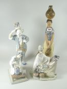 A Lladro pottery model of a water carrying female, together with three other Lladro figures, South