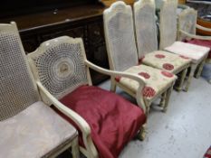 Three pairs of painted continental-type cane back chairs