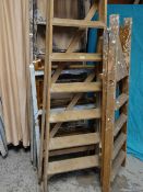 Three vintage wooden stepladders and two tri-fold wooden vintage towel airers