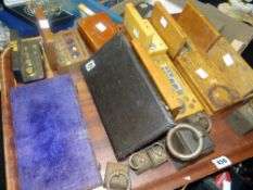 A collection of various boxed brass weights and others