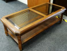 A LONG JOHN COFFEE TABLE modern with hardwood glass top and rattan base