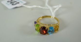 RING being a 9-carat yellow gold multi-colour gem-set ring, 2.7 grams approximately in box.