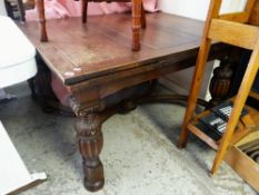 VINTAGE OAK DRAWER-LEAF DINING TABLE with carved baluster legs and cross stretcher