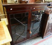 MAHOGANY ASTRAGAL GLAZED BOOKCASE ON RAISED FEET