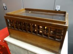 AN UNUSUAL GALLERIED COFFEE TABLE constructed from a salvaged copper planter and with glass top