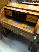 AN UNUSUAL MIXED WOOD ROLL TOP BUREAU