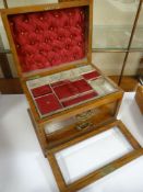 A GOOD VINTAGE WALNUT JEWELLERY CABINET having two base drawers and hinging lid to reveal