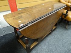 ANTIQUE OAK DROP-LEAF GATELEG TABLE 133 cms at longest x 126 cms wide x 72 cms high