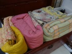 A GOOD PAINTED VINTAGE TIN TRUNK containing three vintage wool blankets and two patchwork quilts