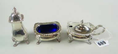 A THREE PIECE EPNS CONDIMENT SET comprising lidded mustard pot, matching salt basin and matching