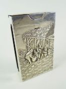 MATCHBOX HOLDER in white metal repousse depicting figure sat in farming landscape, stamped to