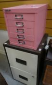 A SMALL BISLEY FIVE DOOR METAL FILING CABINET, together with a similar two-drawer filing cabinet