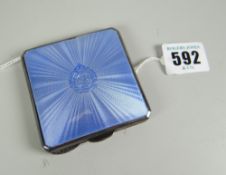 REGIMENTAL COMPACT a ladies vintage compact in silver and blue guilloche enamel with centred