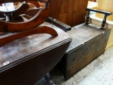 DARK OAK DROP-LEAF REFECTORY STYLE DINING TABLE, together with a carved decorated topped and fronted
