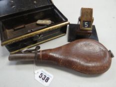 PARCEL INCLUDING a vintage leather shot flask, a small metal rotary advertising desk calendar for