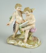 A MEISSEN PORCELAIN GROUP of two scholarly putti, 12cms high