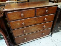 AN EARLY OAK CHEST OF DRAWERS two short above three long