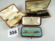 BROOCHES - five various cased and loose bar brooches including three 9ct yellow gold plain examples,