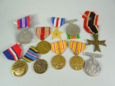 MEDALS being a bag of assorted medals to include WWII period American, British, Kosovo Campaign,