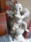 TWO GARDEN CHERUB STATUES playing musical instruments whilst sat aside spheres