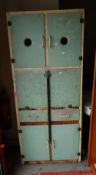 A VINTAGE 'SHEER PRIDE' BLUE AND CREAM PAINTED METAL KITCHEN CABINET with cupboard top and base,