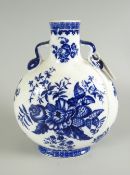 FIRST PERIOD WORCESTER PORCELAIN MOON FLASK VASE with under-glazed blue floral decoration and twin