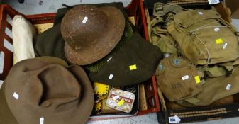 TWO BOXES OF VINTAGE MILITARY ITEMS including webbed items, water bottles, tin helmets etc