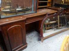 AN EDWARDIAN BREAKFRONT MIRROR-BACKED SIDEBOARD, centre drawer flanked by two cupboards