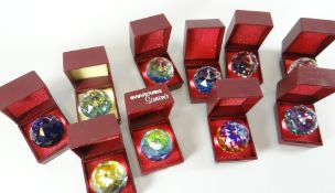 TEN CASED SWAROVSKI CRYSTAL GLASS SOUVENIR PAPERWEIGHTS