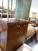 A MID-C20TH OAK SINGLE DRAWER BASE, together with a Lloyd Loom linen basket and small bedroom table