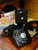 A VINTAGE TWO-PIECE BLACK TELEPHONE and a parcel of 78rpm records
