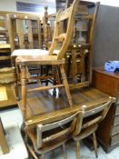 A VINTAGE OAK EXTENDING DRAWER-LEAF TABLE, together with six chairs (not matching)