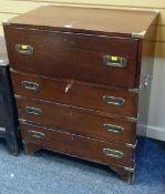 A REPRODUCTION CAMPAIGN-STYLE SECRETAIRE of four graduated drawers, 76cms wide