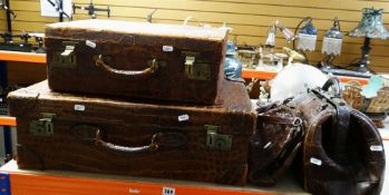 TWO VINTAGE CROCODILE SKIN SUITCASES, a crocodile skin Gladstone-style bag and similar handbag