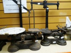THREE VINTAGE CAST METAL WEIGHING SCALES