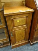 EARLY C20TH MIXED WOOD POT-BOARD CUPBOARD with panelled door revealing fitted shelf 84 cms high