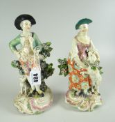 A PAIR OF DERBY PORCELAIN FIGURES modelled as a shepherd and shepherdess, the female with lamb,
