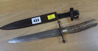 A HUNTING KNIFE having a horn handle, steel blade impressed 'AKAH' complete with leather scabbard