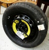 A SPARE WHEEL KIT (AS NEW) for a Skoda car Octavia with jack and brace