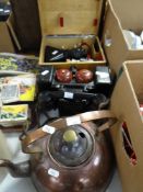 A VINTAGE MILITARY FIELD STYLE TELEPHONE AND RECEIVER, boxed, lenses, copper kettle